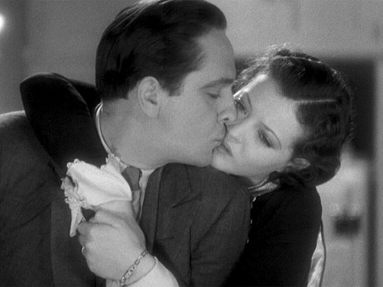 Jerry with Joan hugging him from behind