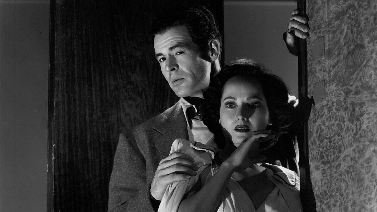 Robert Ryan and Merle Oberon