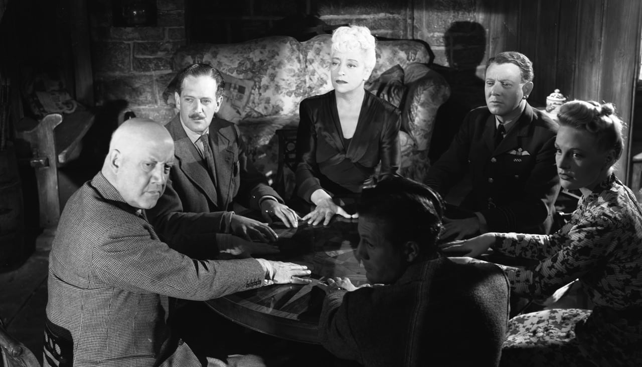 The guests hold a seance