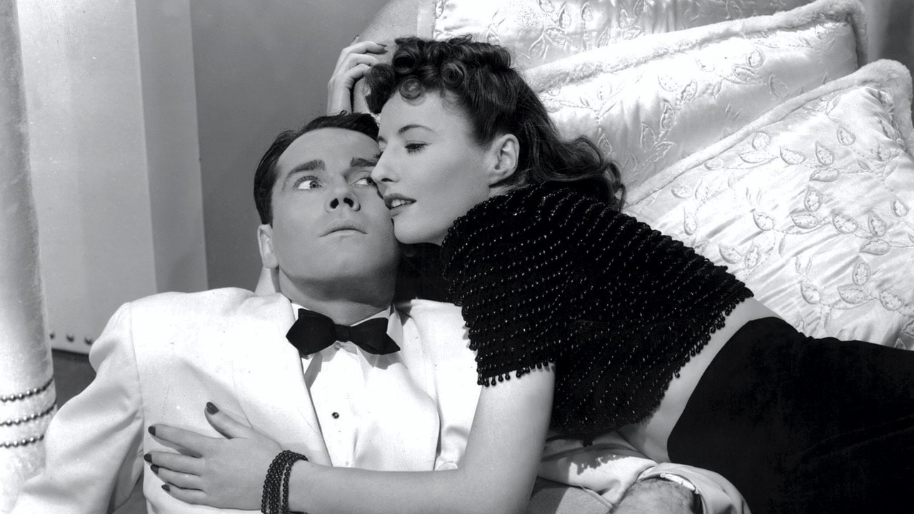 Charles and Jean cheek to cheek