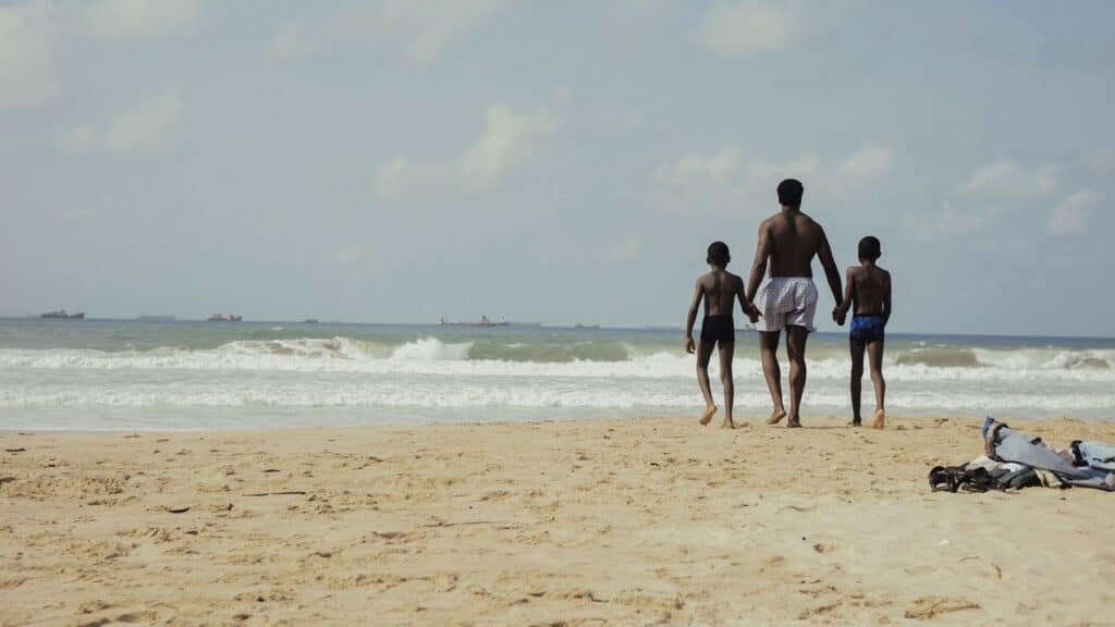 Dad and his boys at the beach