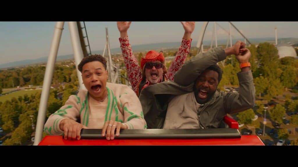 Otto and two new friends on a funfair ride