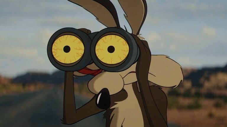 Wile E Coyote scans the horizon with Acme binoculars