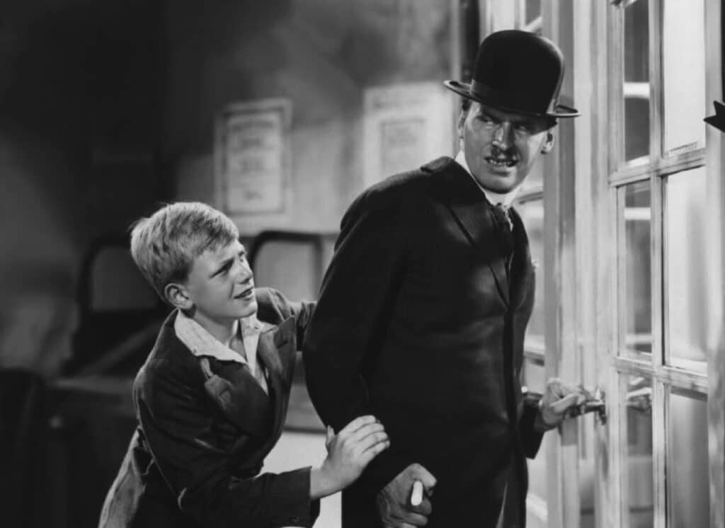 Emil tackles the bowler-hatted man