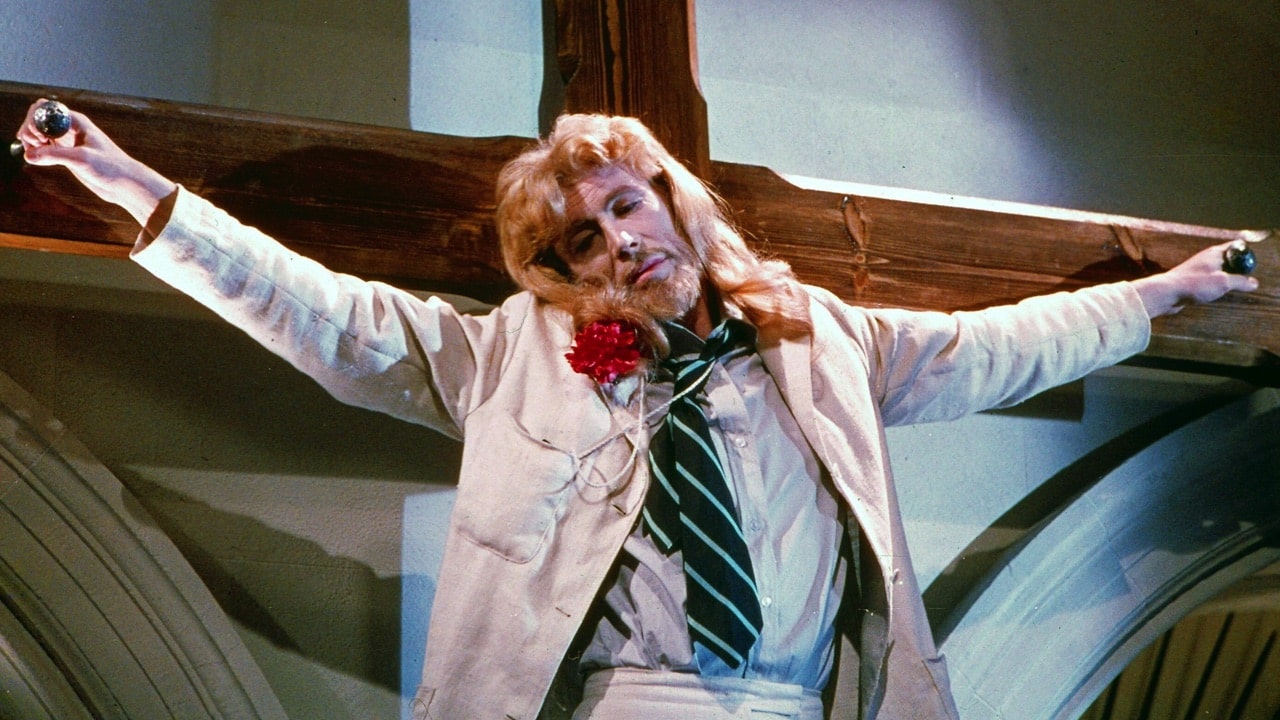 Peter O'Toole hanging off a cross